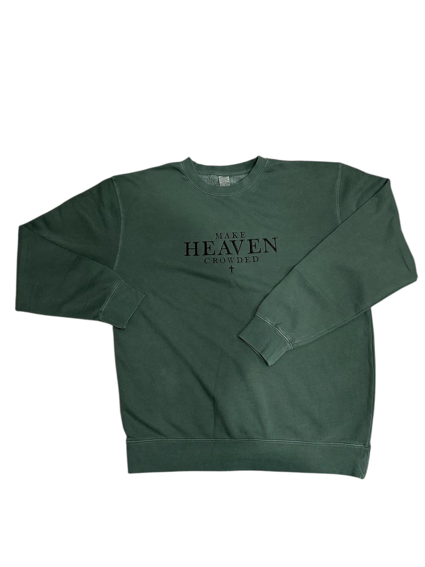 Green sweatshirt with 'MAKE HEAVEN CROWDED' text and cross symbol embroidered in black on the front center chest. This view is a zoomed out view of the design with sleeves folded for display.