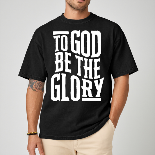 Male wearing a black tshirt with white text about glory