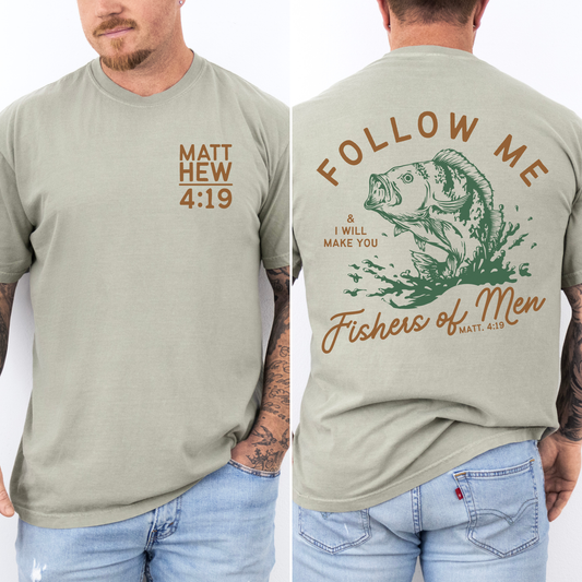 Male model wearing sandstone tshirt with fishers of men graphic in green and burnt orange
