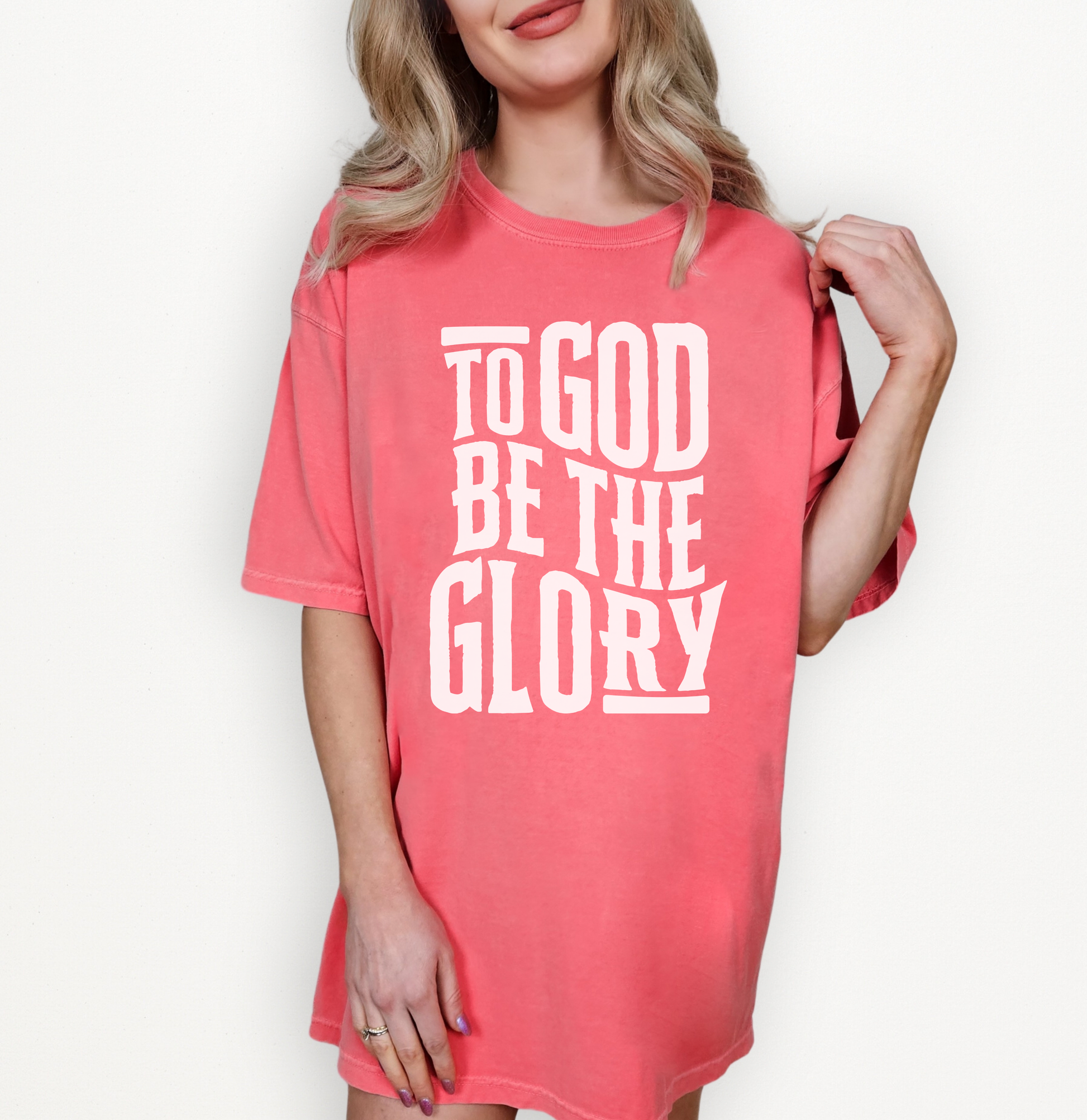 Female wearing a black tshirt with white text about glory
